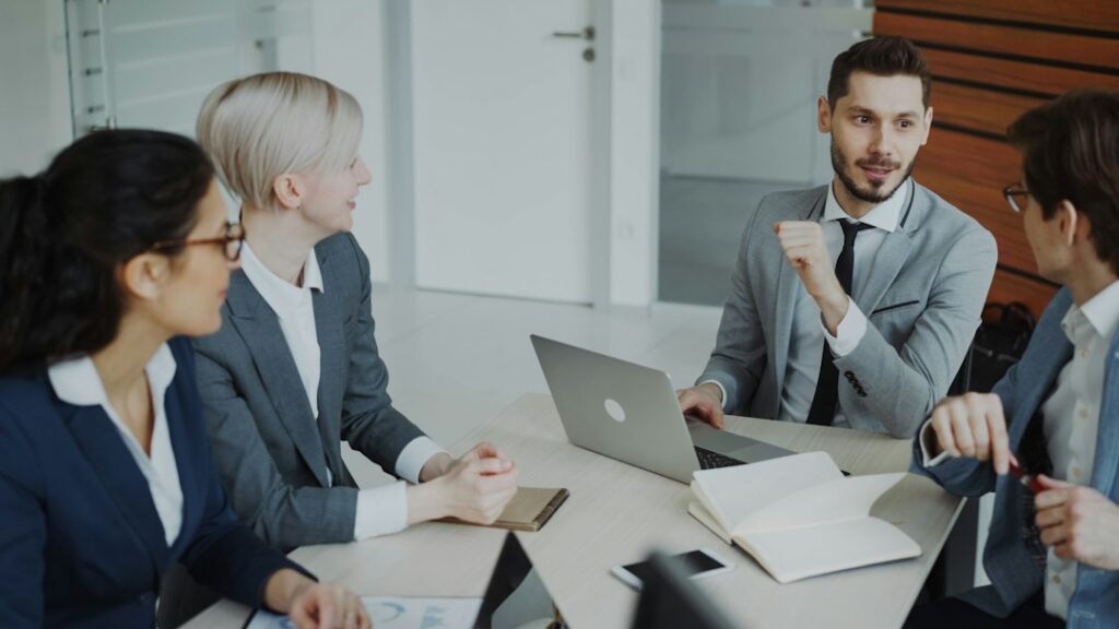 Business professionals reviewing information in an office